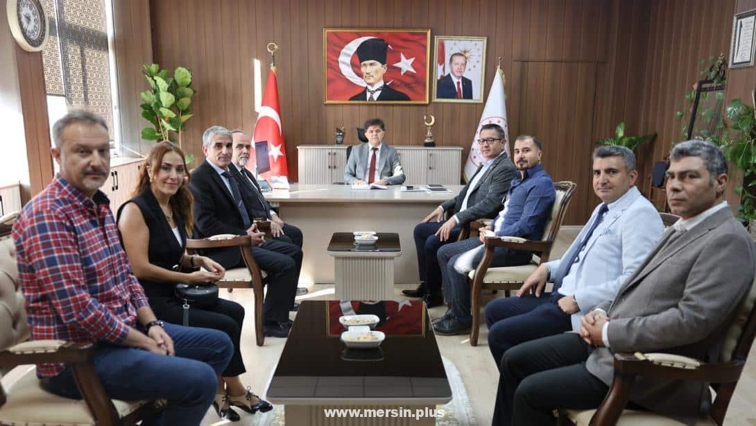 Eğitim-İş Mersin Şube Başkanı Yakup Tekin’den Müdür Muhammed Özdemirci’ye Ziyaret